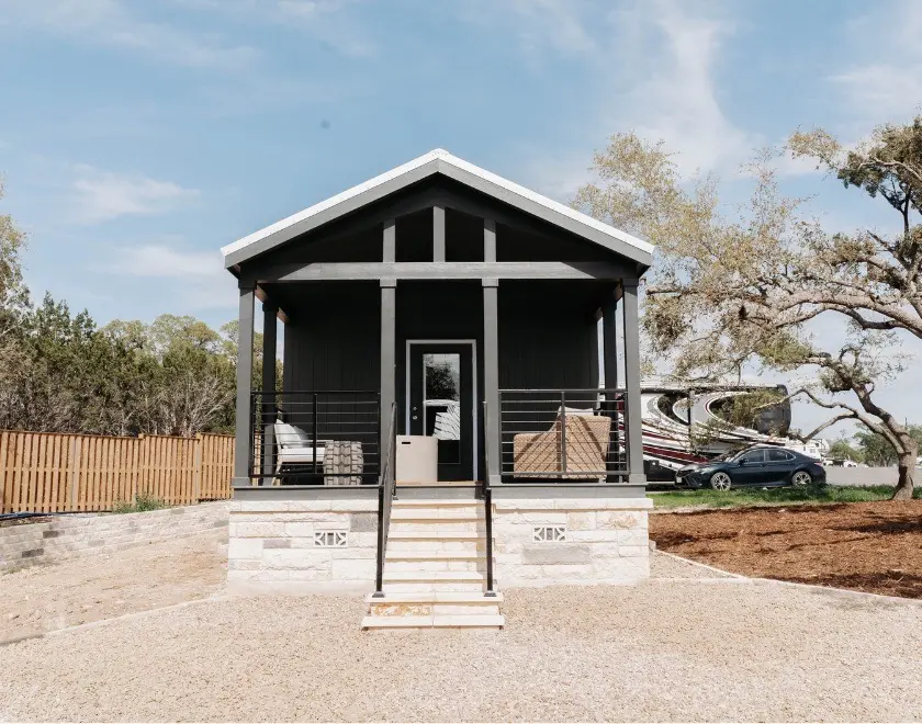 The Secretariat cabin exterior at Horseshoe Ridge RV Resort, Texas Hill Country