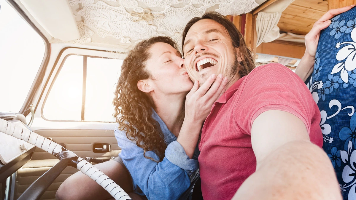 Romantic RV Getaways   The Perfect Valentine’s Day Trip to Texas   happy couple on road trip