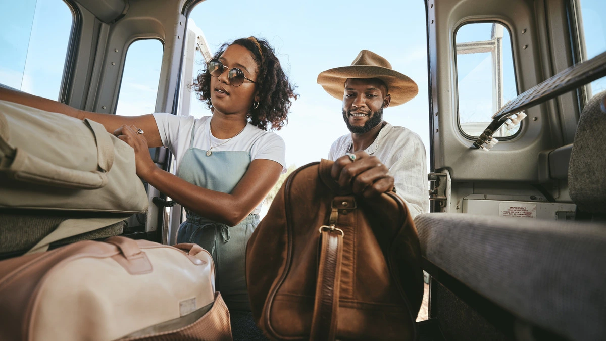 How to Plan the Perfect RV Trip to the Texas Hill Country   couple packing up for a trip