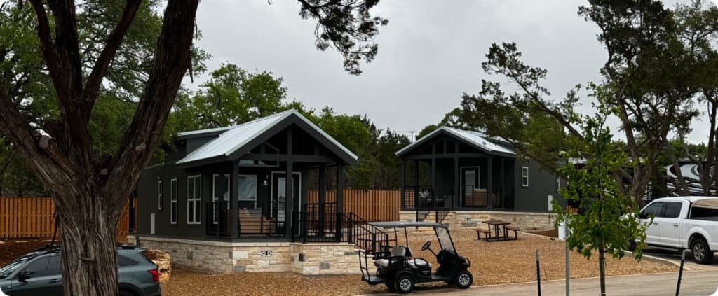 Horseshoe Ridge RV park cabins with modern design and outdoor seating areas.