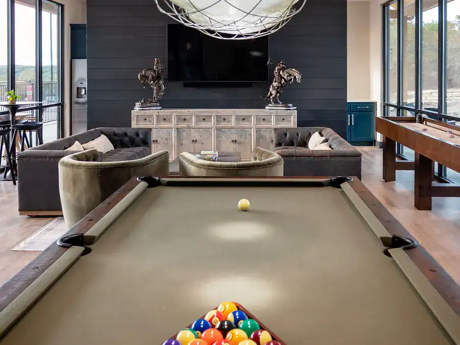 Indoor Lounge with a pool table, shuffleboard and leather seating at Horseshoe Ridge